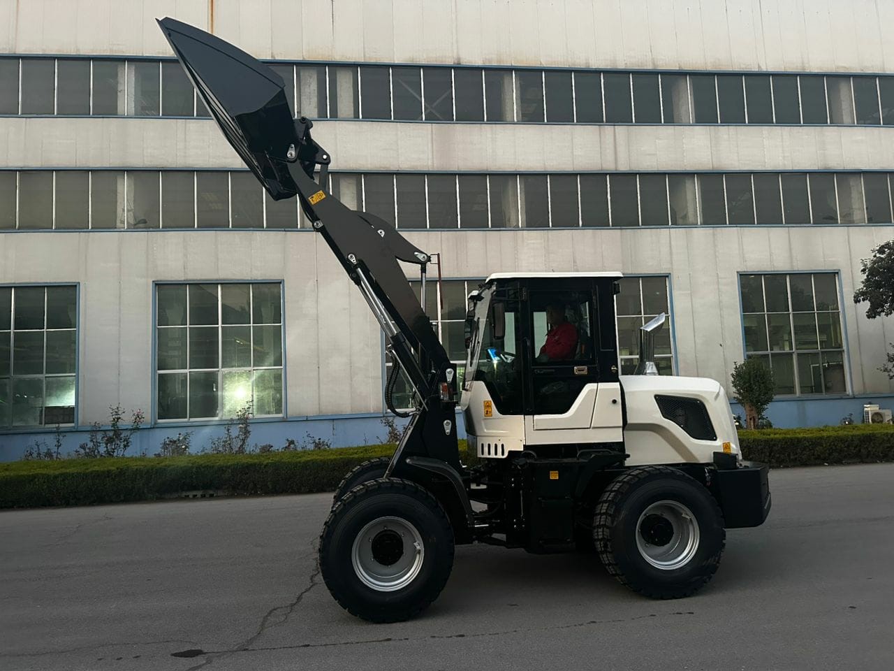 a yellow and black construction vehicle